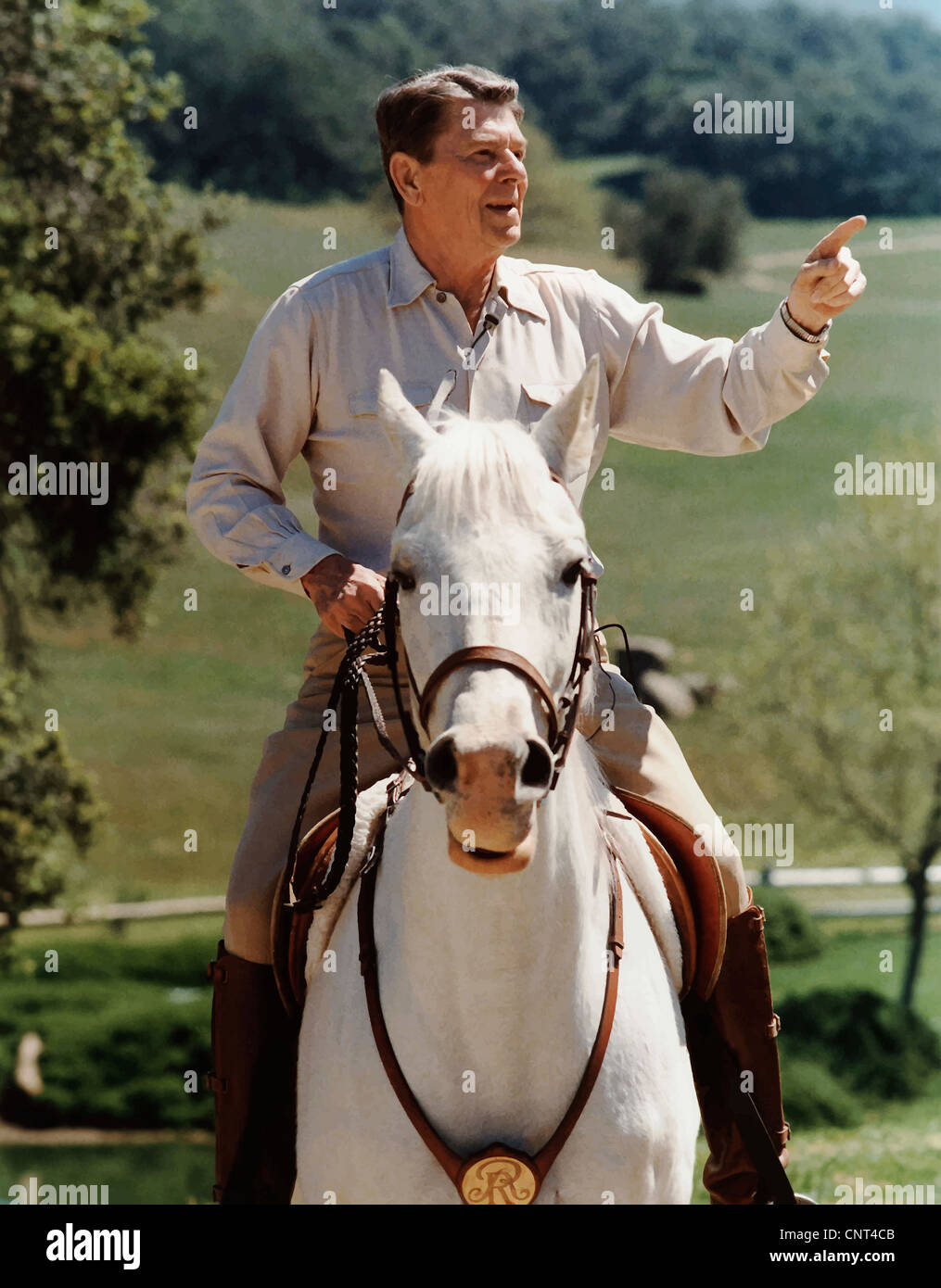 Digitally restored vector photo of President Ronald Reagan on horseback. Stock Photo