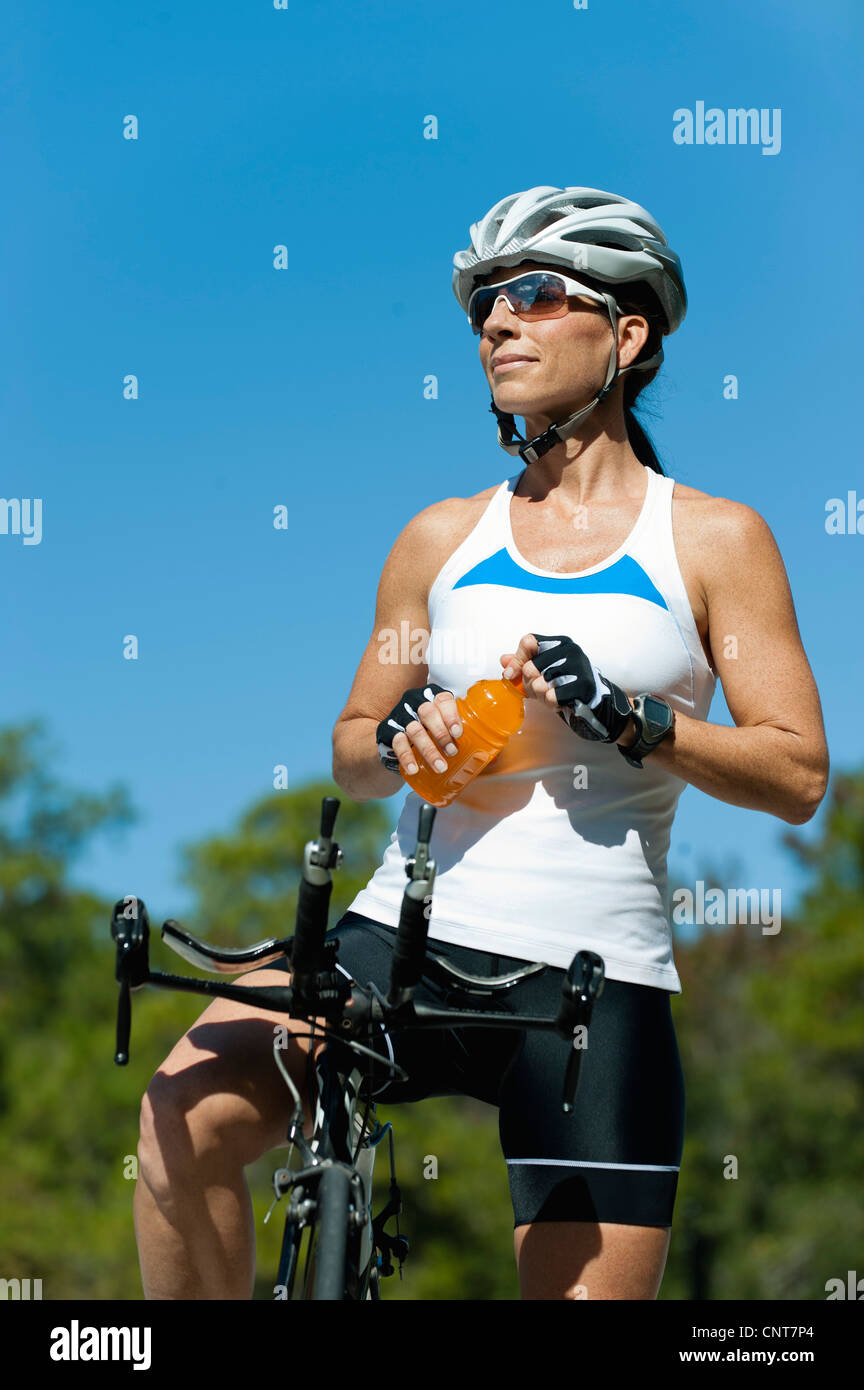 Female cyclist taking break Stock Photo Alamy