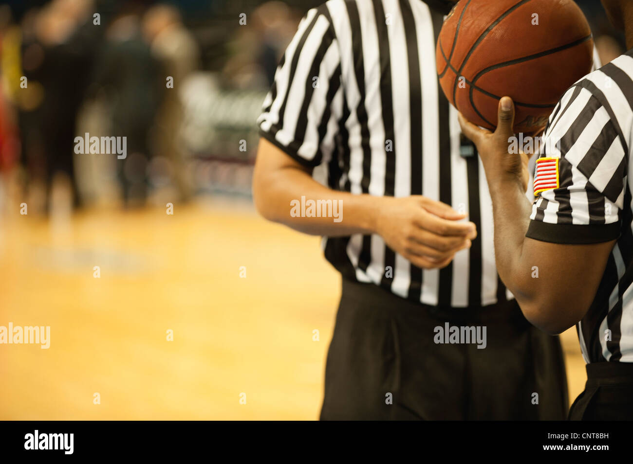 Basketball referees, cropped Stock Photo Alamy