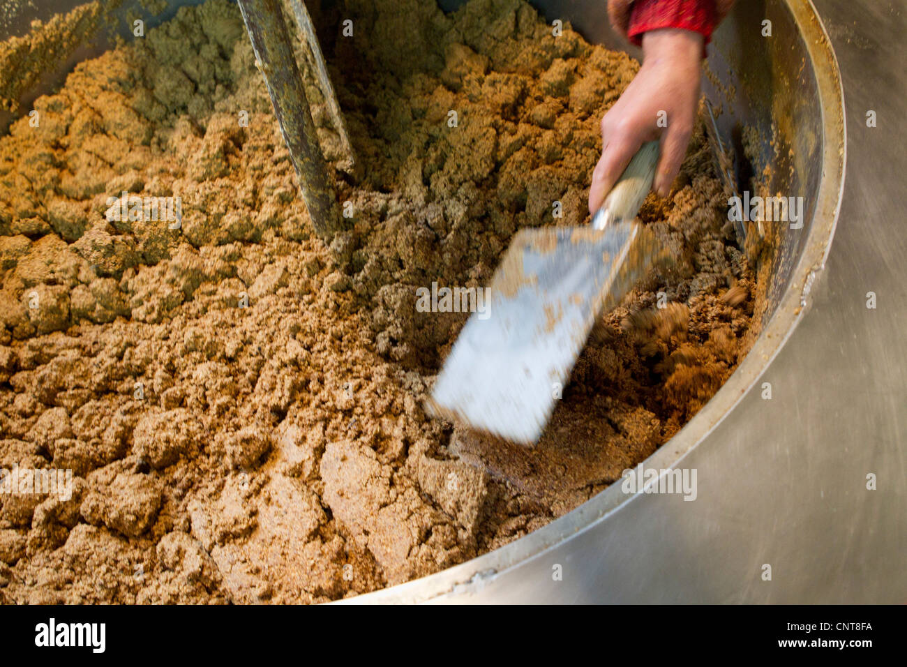 Making walnut oil Stock Photo Alamy