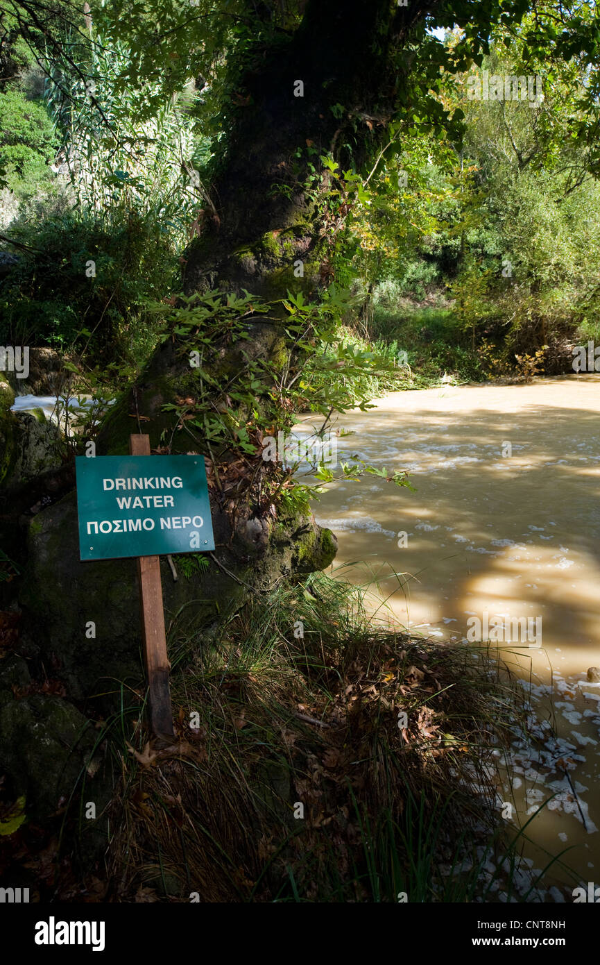 sign drinking water at a shabby pond, Greece, Peloponnes Stock Photo