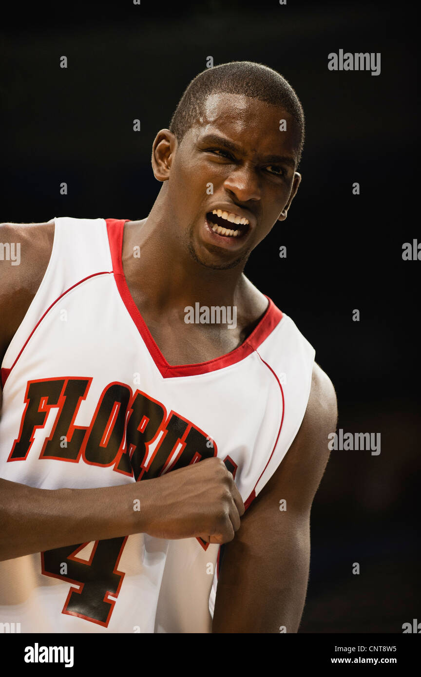Basketball player cheering Stock Photo Alamy