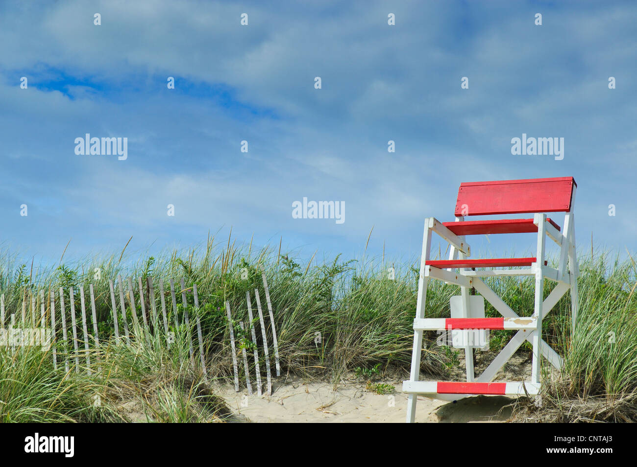 Red and white lifeguard chair at Misquamicut State Beach in Westerly Rhode Island USA Stock Photo