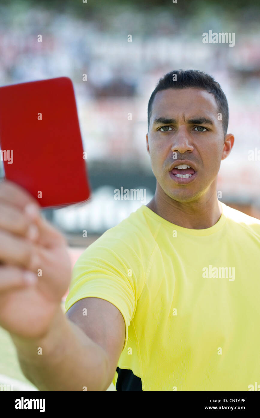 Referee holding red card Stock Photo Alamy