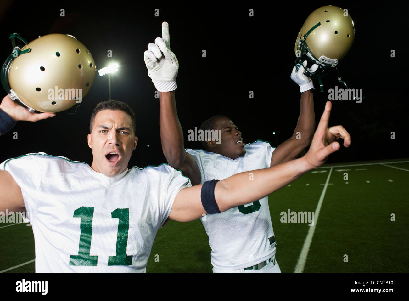 Football players celebrating victory Stock Photo Alamy