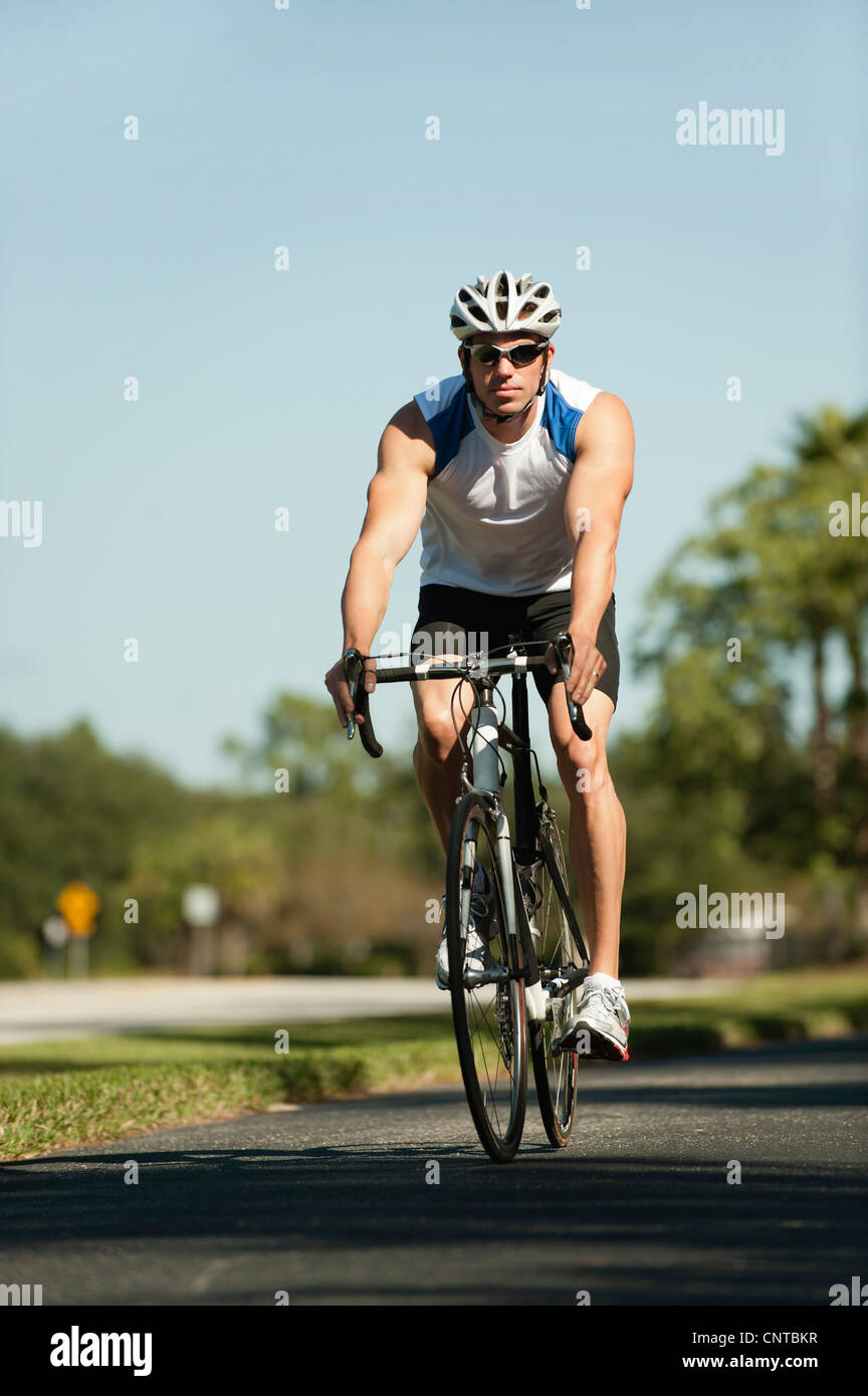Man riding bicycle Stock Photo Alamy