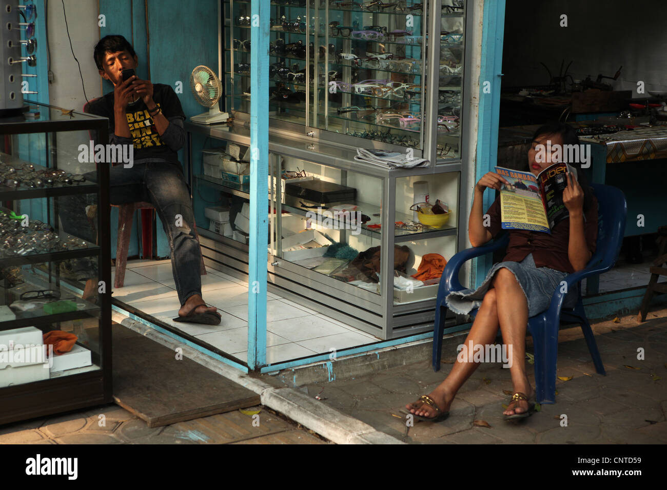 Glasses street sellers in Alun Alun Utara square in Surakarta, Central Java, Indonesia. Stock Photo