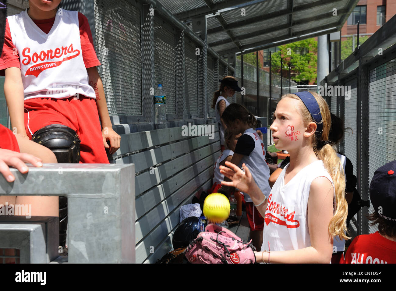 Members of a Little League softball team for girls 8 to 10 in Battery Park City, Manhattan. Stock Photo