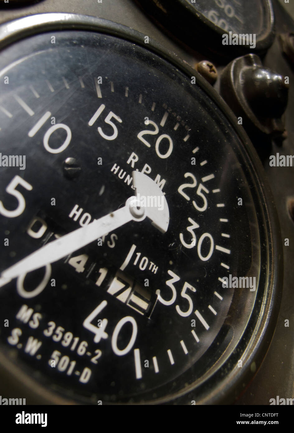 rev counter and hours run meter on vintage military vehicle Stock Photo