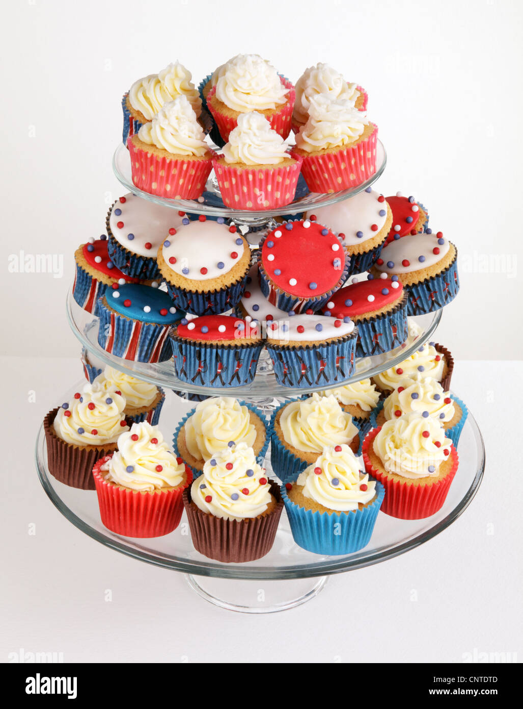 RED,WHITE AND BLUE CUPCAKES ON CAKE STAND Stock Photo