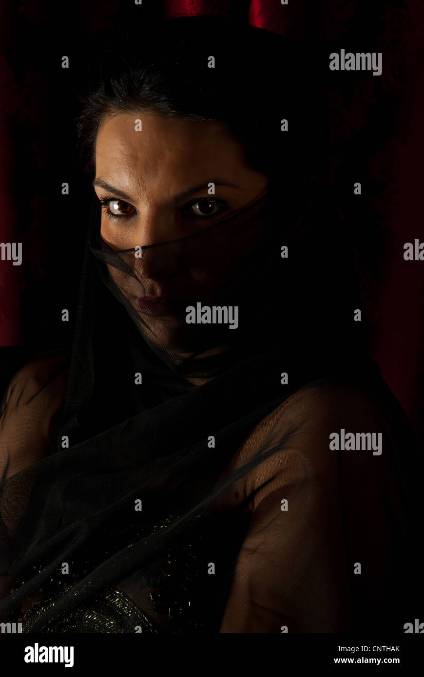 Close up of woman with veil on face in night Stock Photo - Alamy
