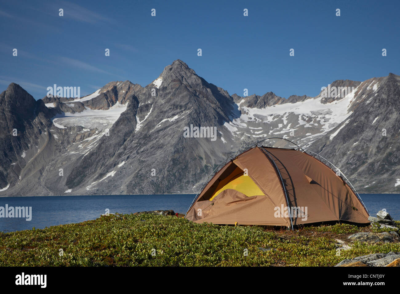 tent in front of mountain scenery near Griseoen, Greenland, Ammassalik, East Greenland, Kuummiit Stock Photo