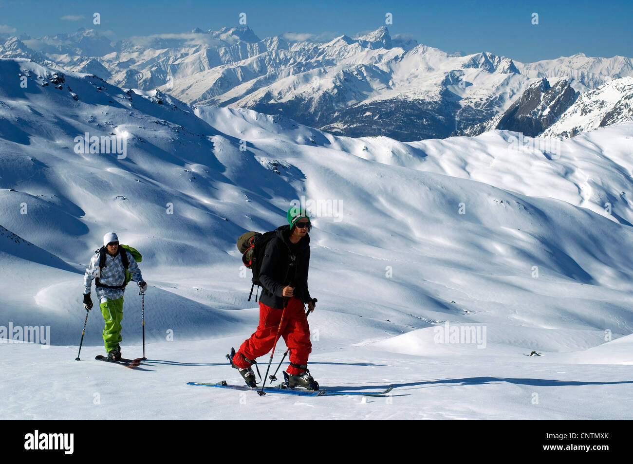 two men ski hiking in the Alps, France, Savoie, Vanoise National Park Stock Photo