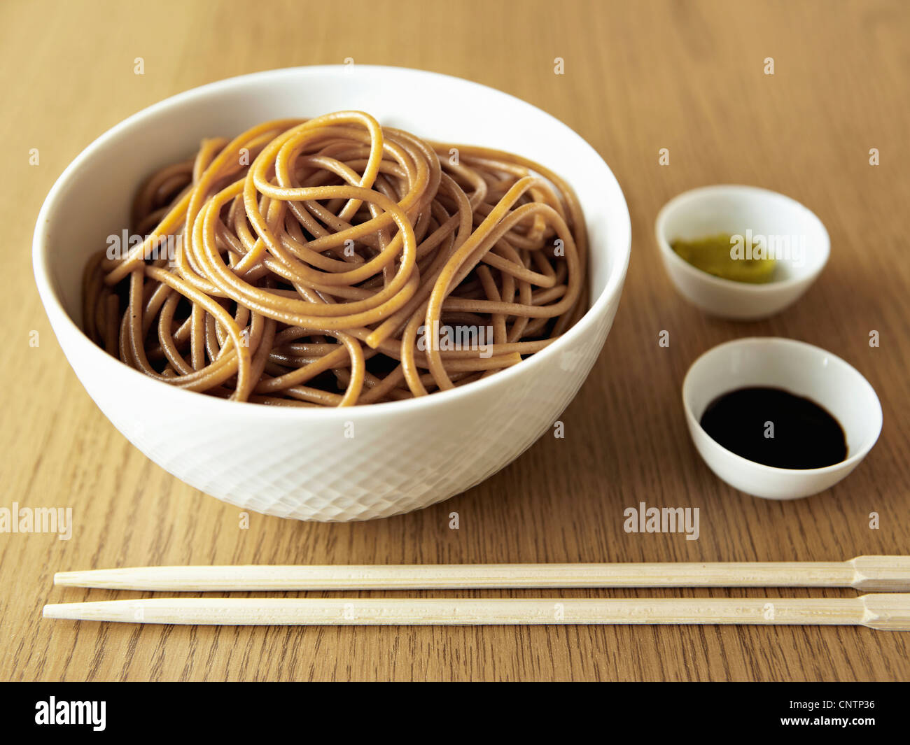 Bowl of noodles with chopsticks Stock Photo Alamy
