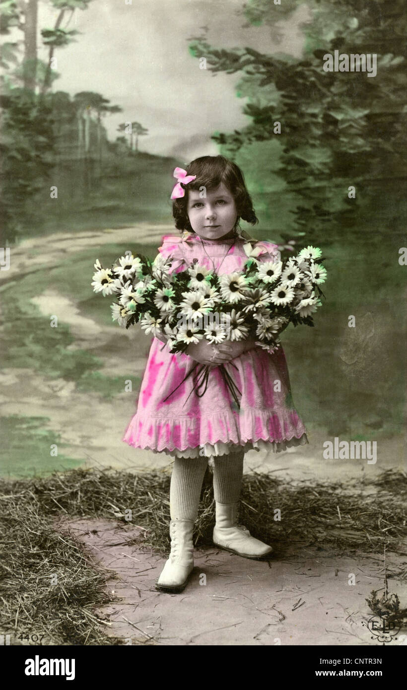 kitsch / souvenir, kitsch postcards, little girl with flowers in the arm in frilled dress, coloured postcard, circa 1900, Additional-Rights-Clearences-Not Available Stock Photo