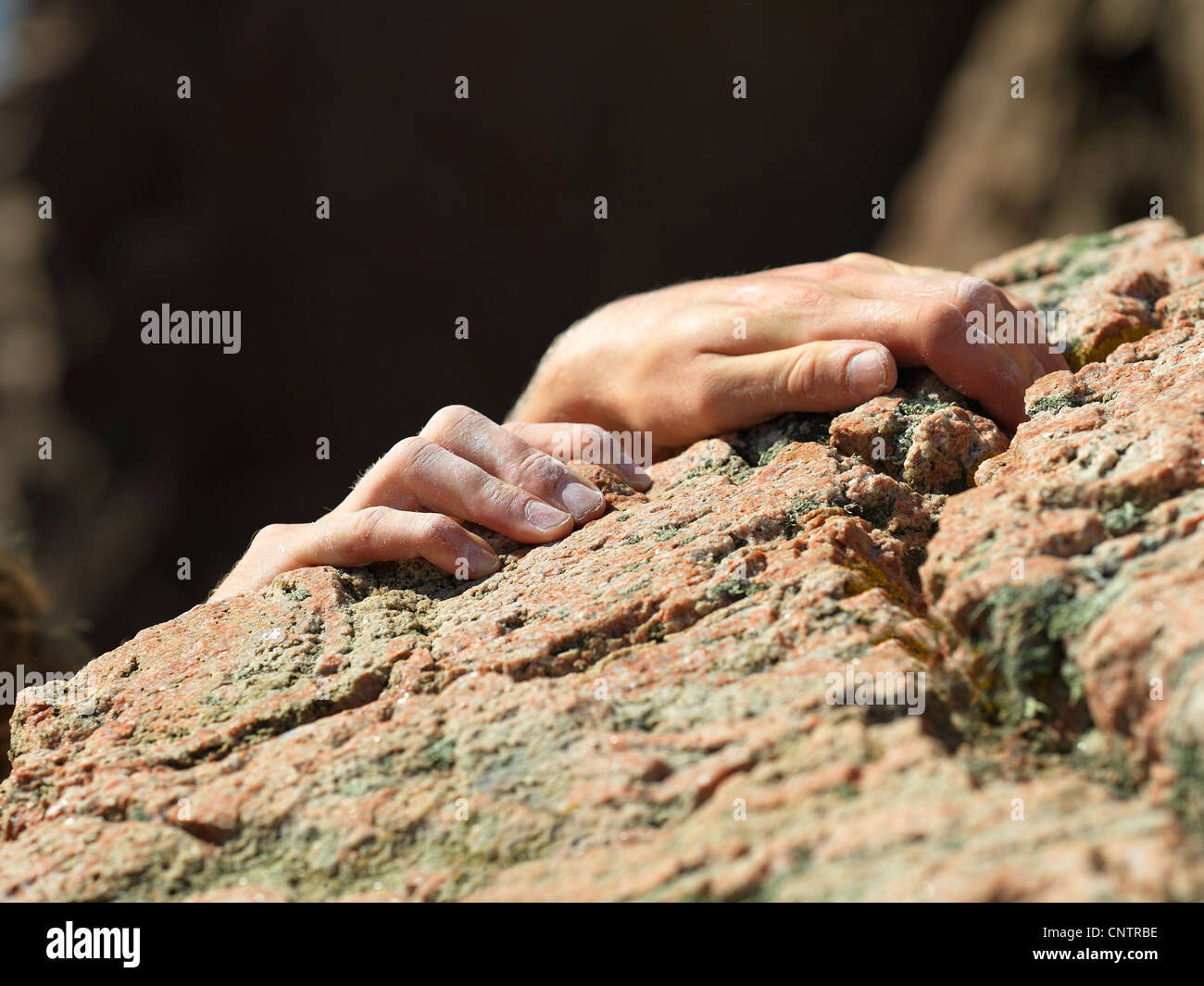Close up of rock climbers hands Stock Photo