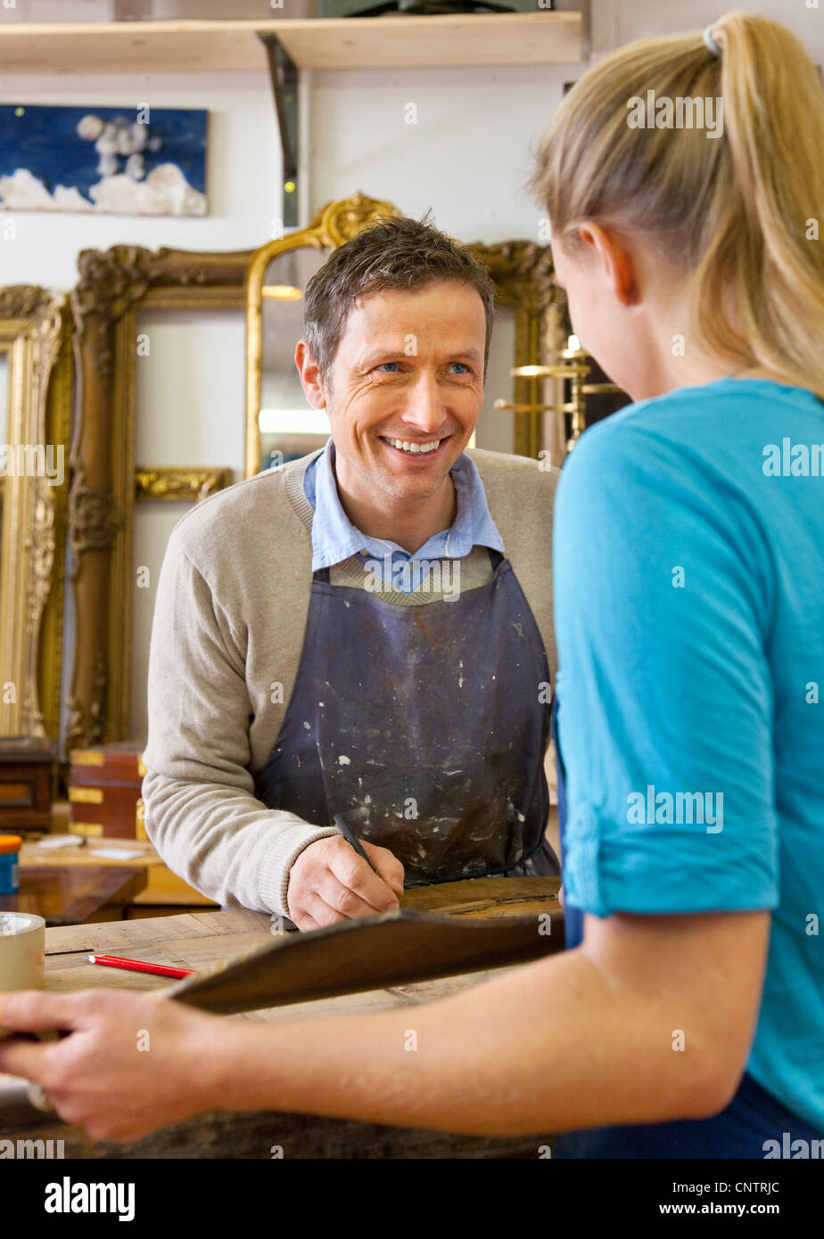 Woman man teamwork carpentry shop hi-res stock photography and images ...