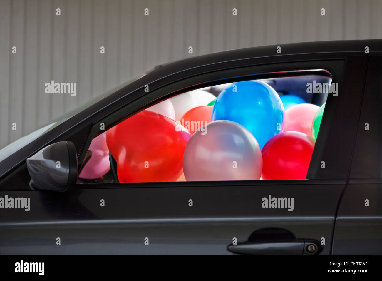 Car filled balloons hires stock photography and images Alamy