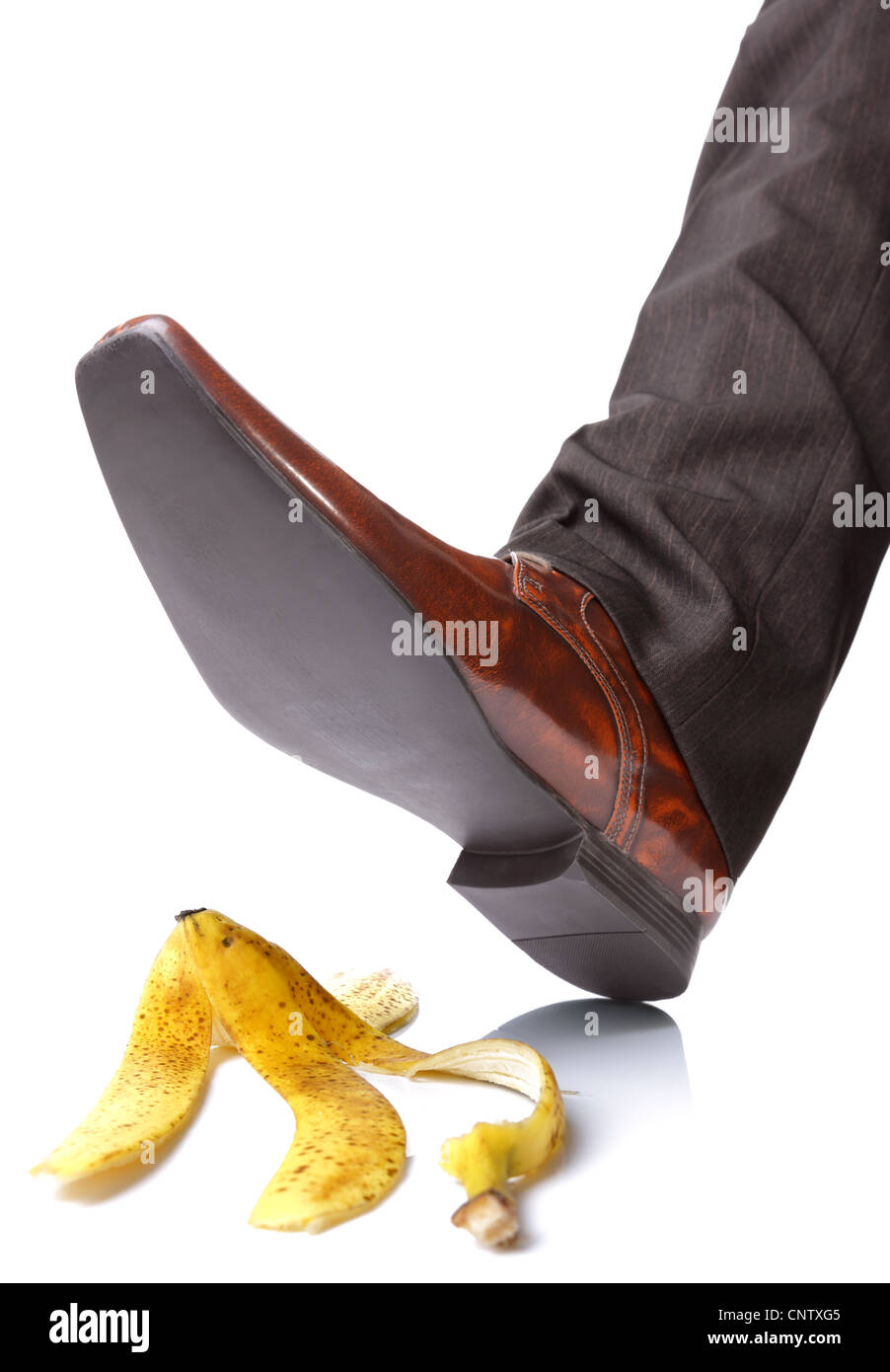 Falling on a banana skin Stock Photo