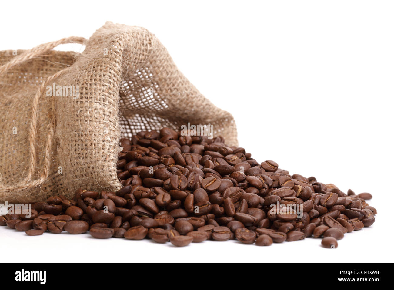 Coffee beans overflowing Stock Photo