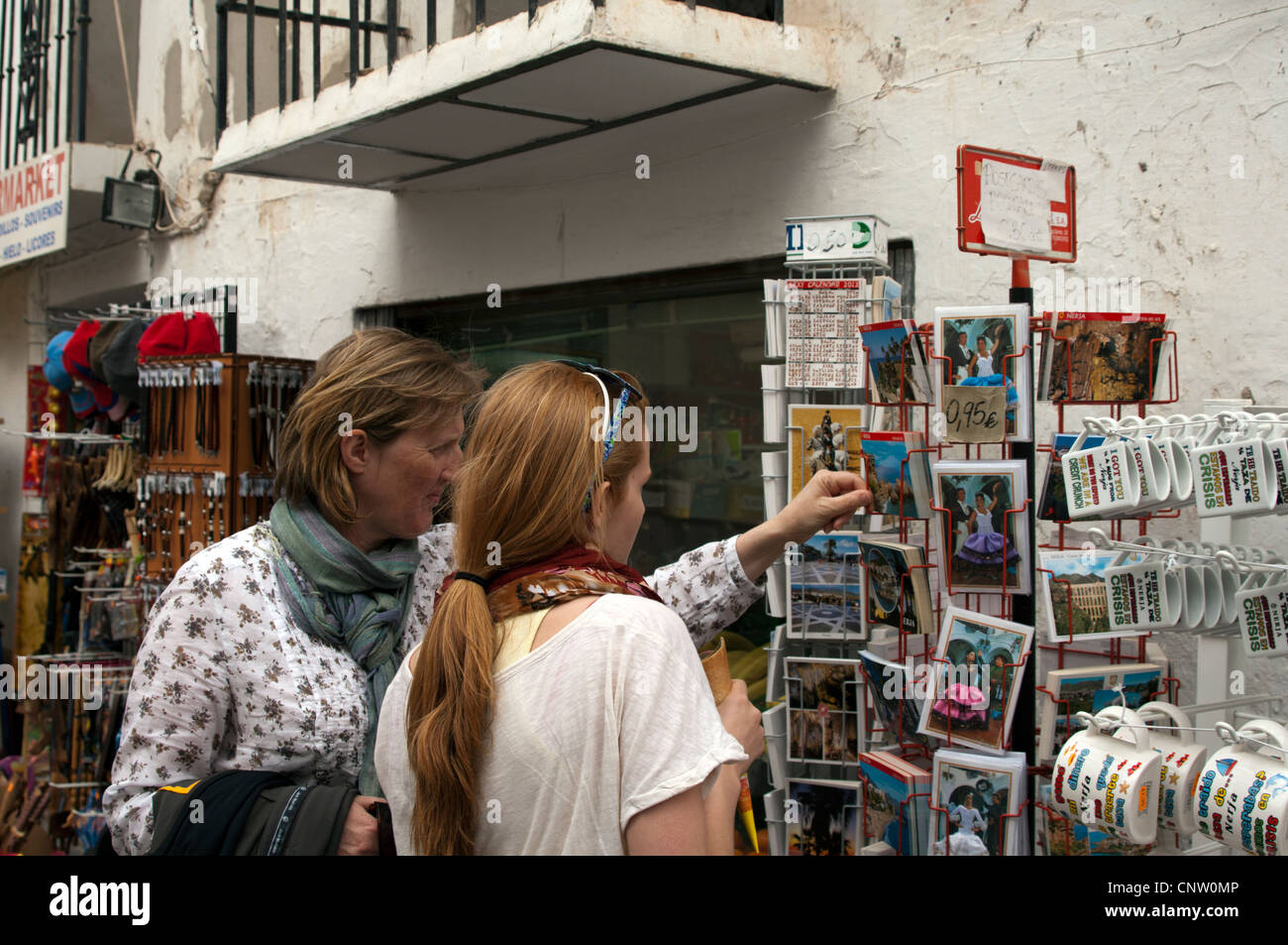 Tourists shopping for postcards in Spain, Costa Del Sol Stock Photo