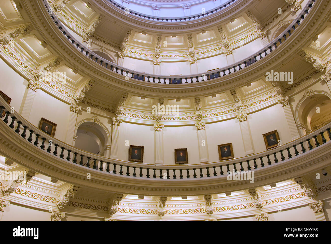 The Texas State Capitol rotunda features portraits of the state's past governors. Stock Photo