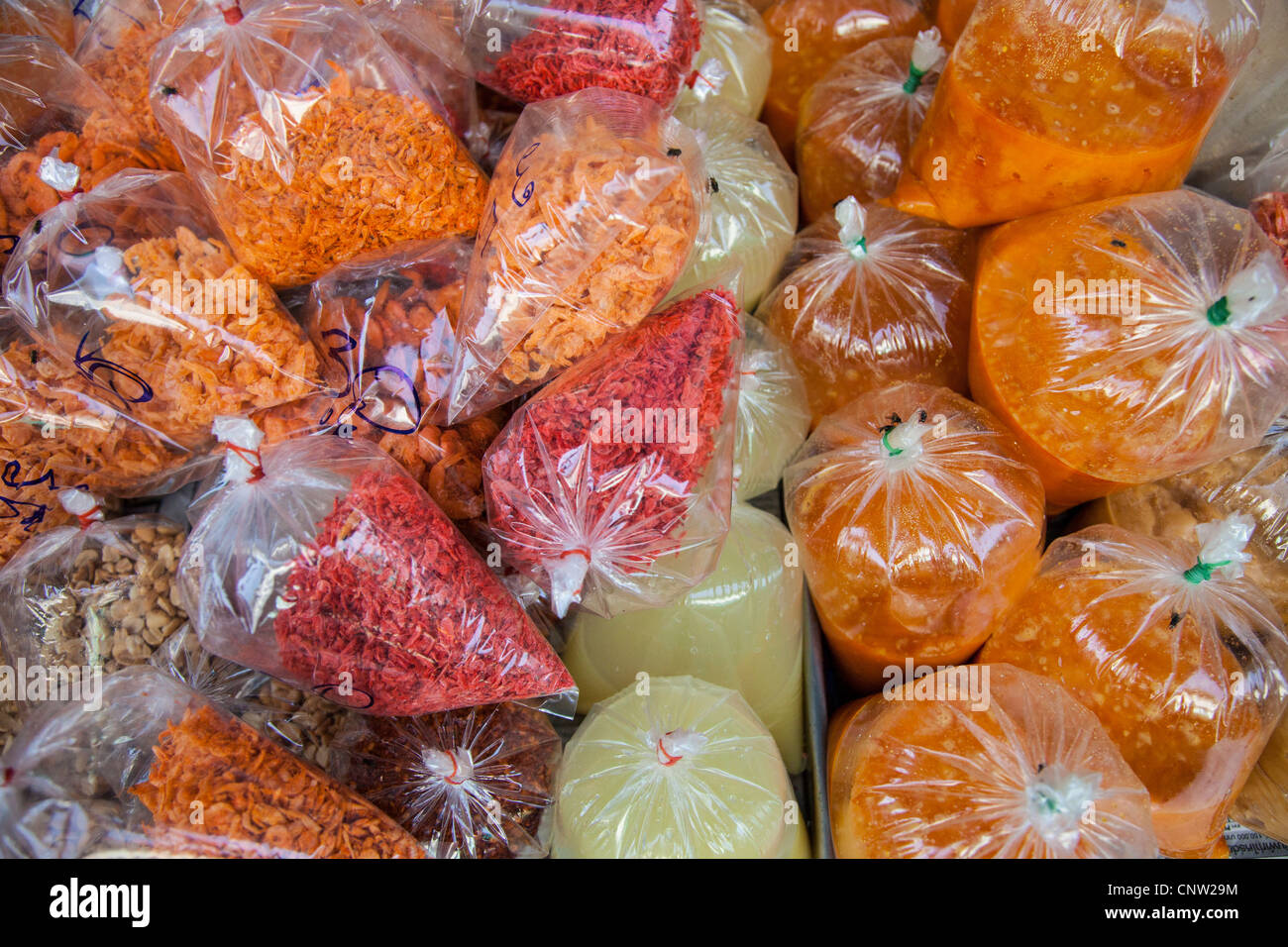 Bagged ingredients at Khlong Toey market in Bangkok, Thailand Stock Photo