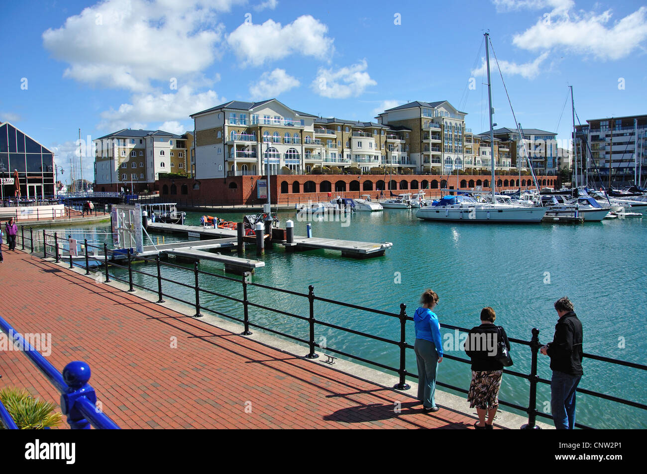 Marina walkway in Sovereign Harbour, Eastbourne, East Sussex, England, United Kingdom Stock