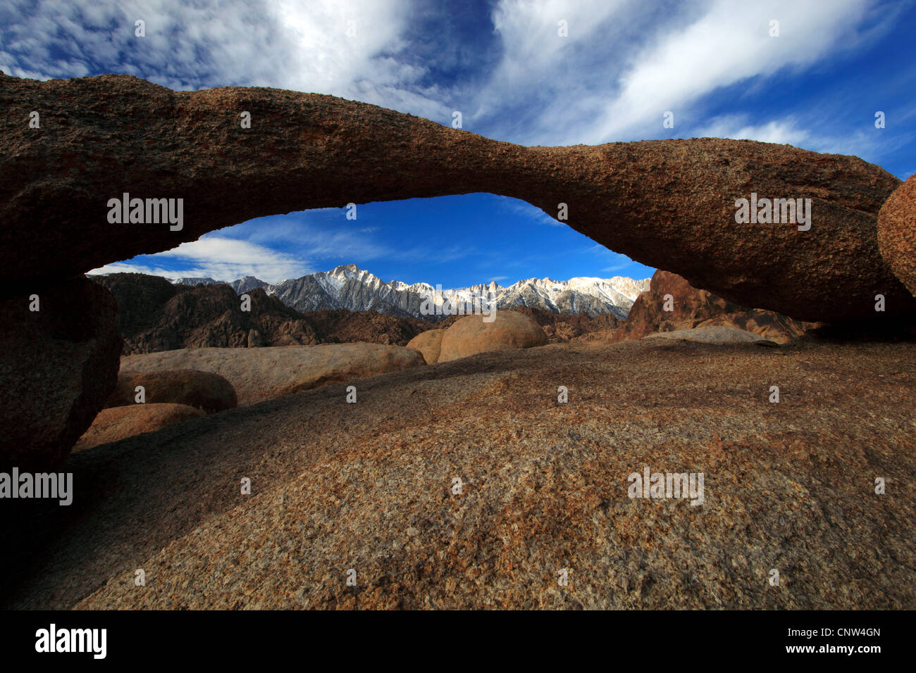 Arch Frames Lone Pine Peak, Alabama Hills near Lone Pine, arch from eroded granite, USA, California Stock Photo