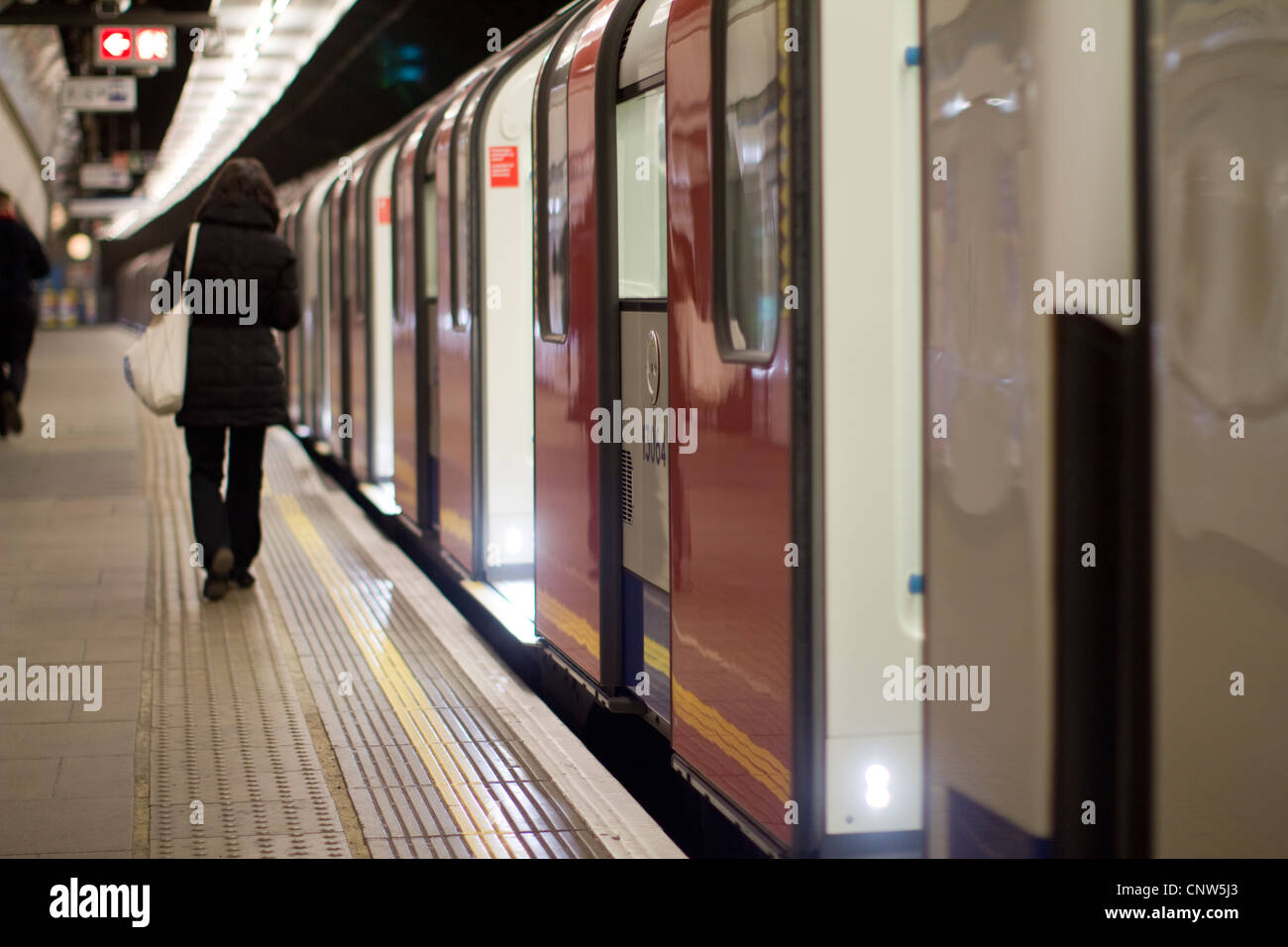 London Underground tube network, passengers getting on train on Victoria Line Walthamstow Stock Photo