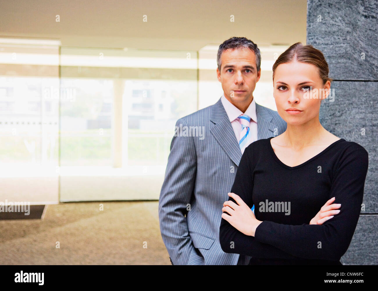 Business people standing in office Stock Photo