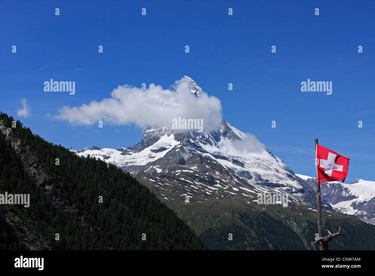 Matterhorn, Swiss flag in the foreground, Switzerland, Valais, Findeln Stock Photo
