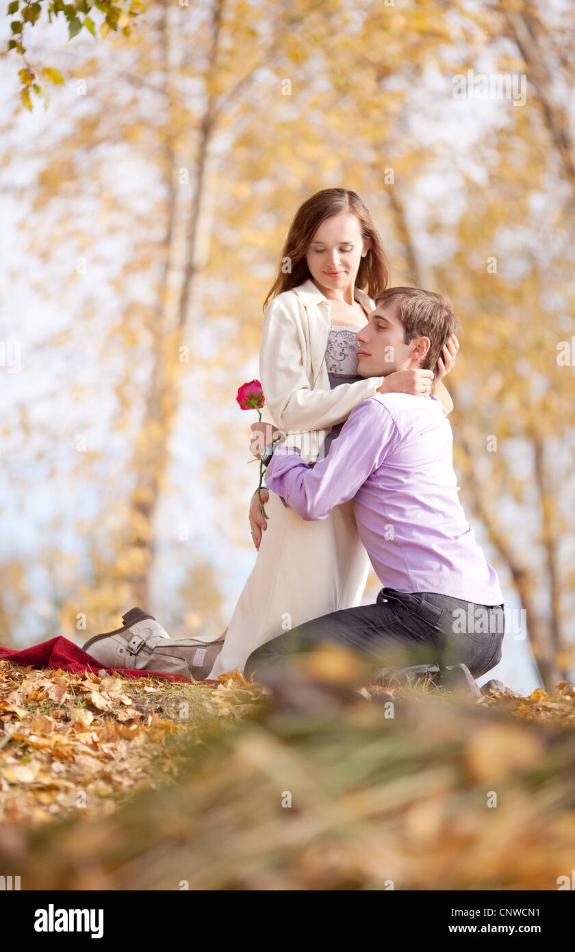 happy young couple in the park Stock Photo - Alamy
