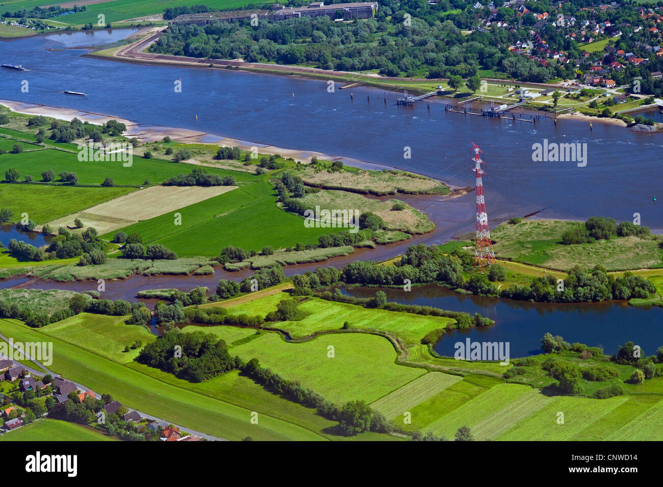 branches of Weser River near Berne, submarine pen of Bremen Blumenthal in background, Germany, Lower Saxony, Wesermarsch Stock Photo
