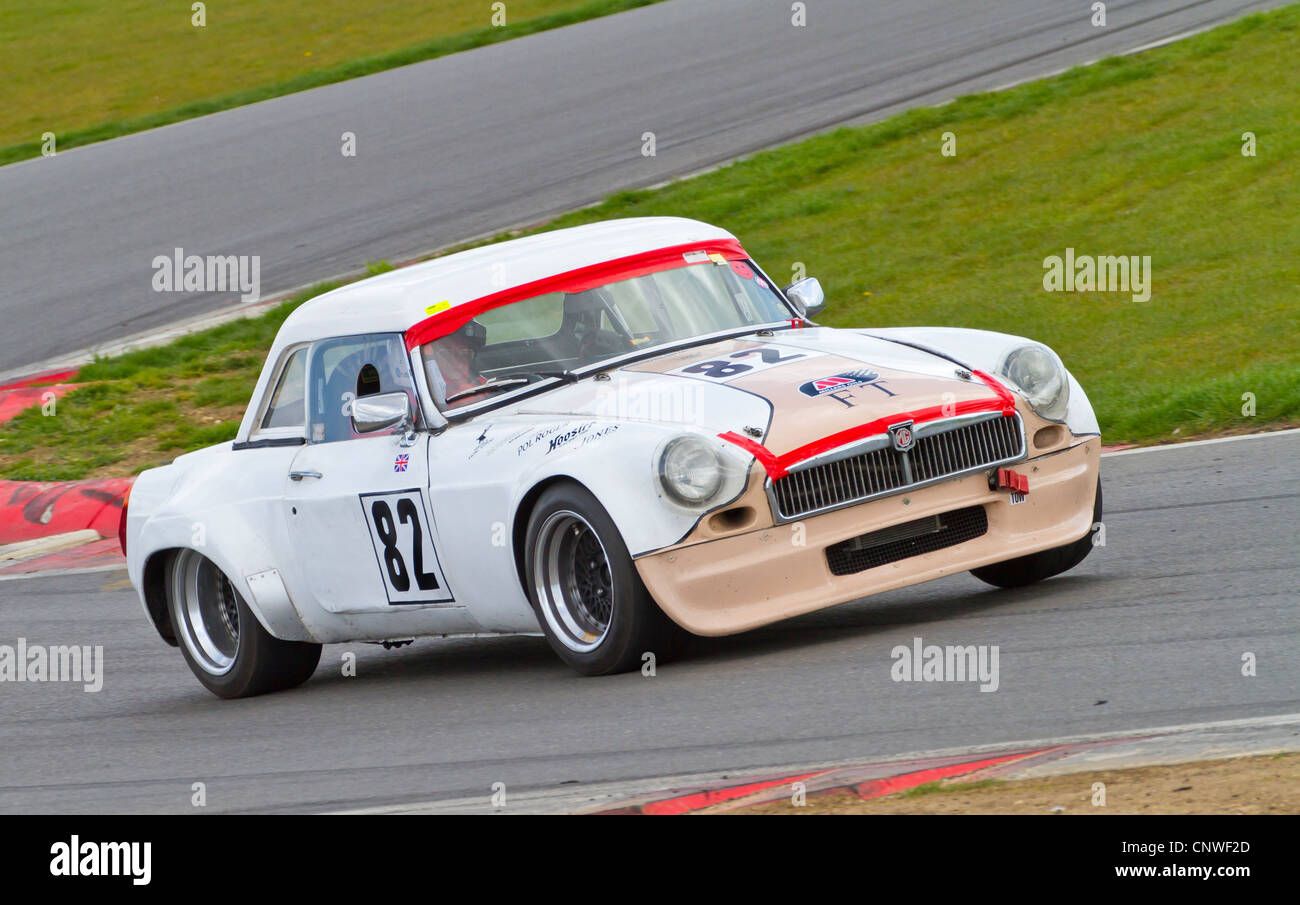 1974 MGB V8 with driver Andrew Riley during the CSCC HVRA V8 race at Snetterton, Norfolk, UK. Stock Photo