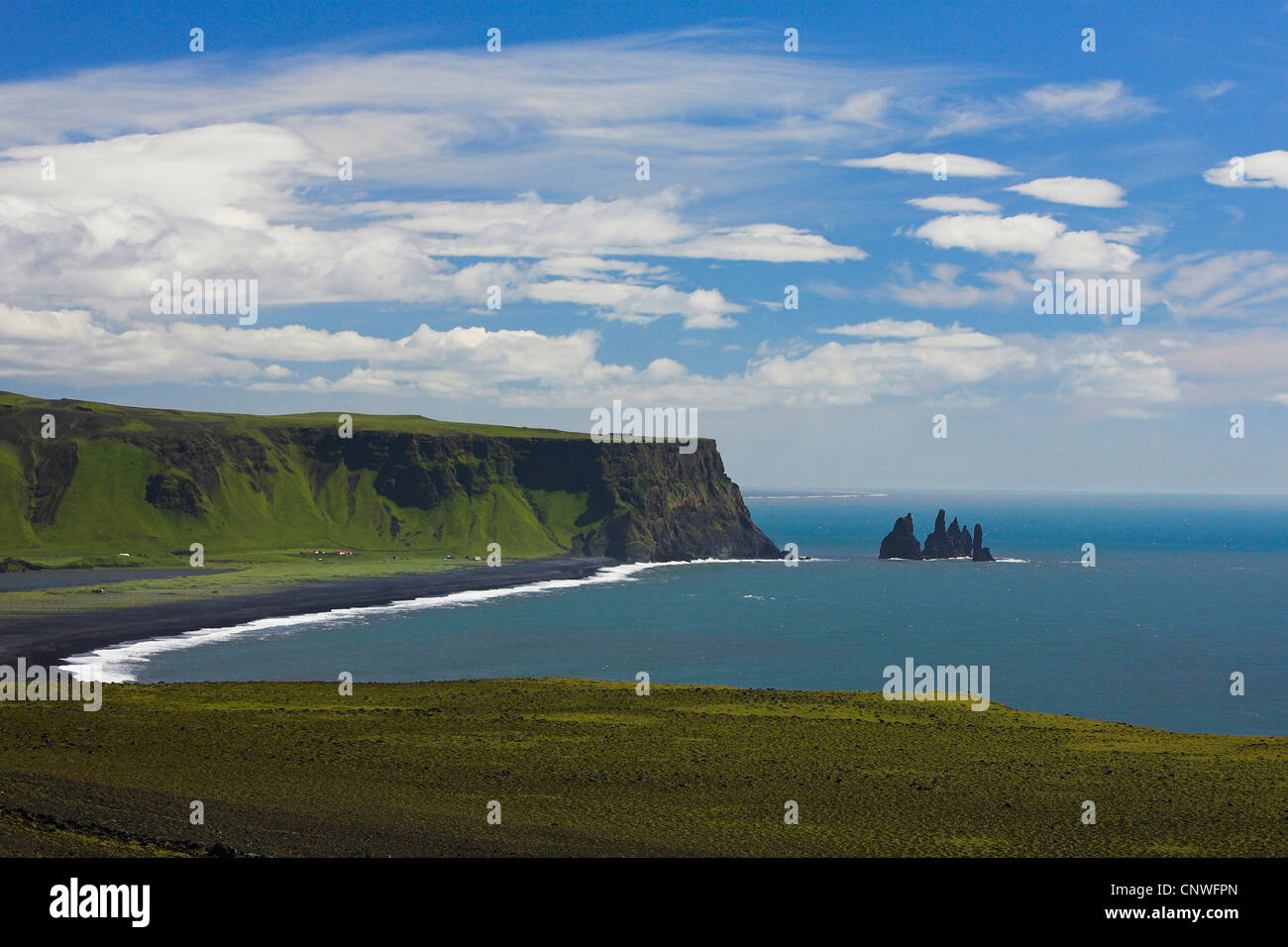famous black rock needles 'Reynisdrangar' in front of cliff line at the southernmost place on Island, Iceland, Mrdalur, Vik i Myrdal Stock Photo