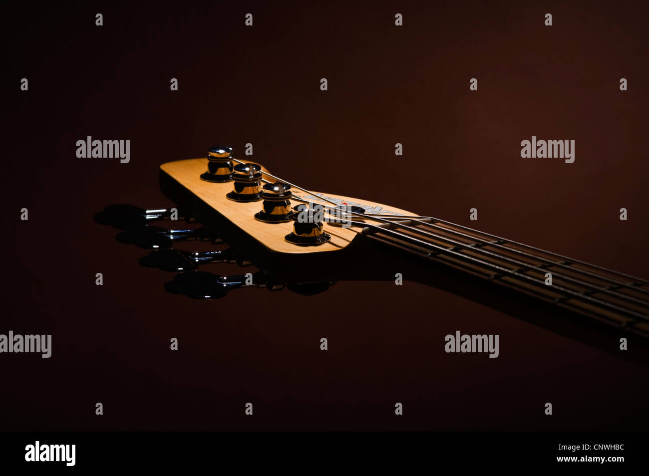 bass guitar head on brown Stock Photo Alamy