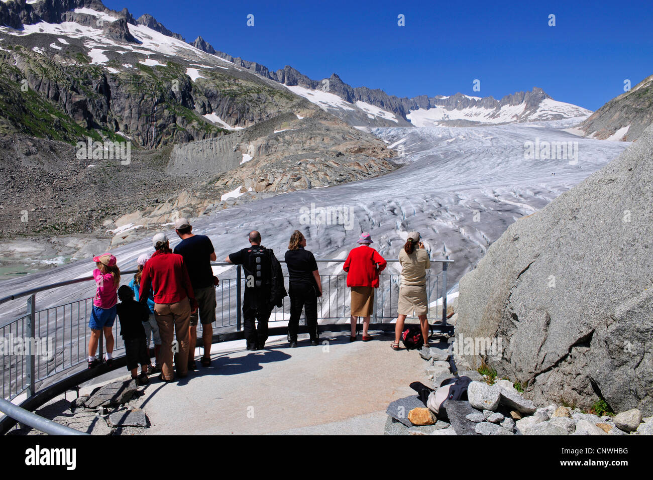 view from viewing platform with visitors at the Rhne Glacier, Switzerland, Valais Stock Photo