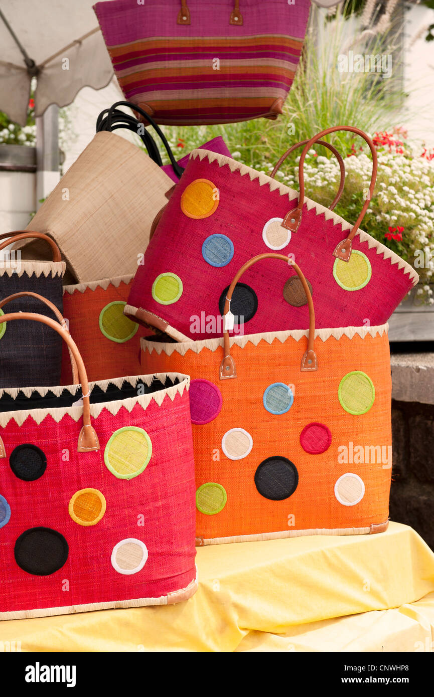 shopping bags for sale on a market stall Stock Photo Alamy