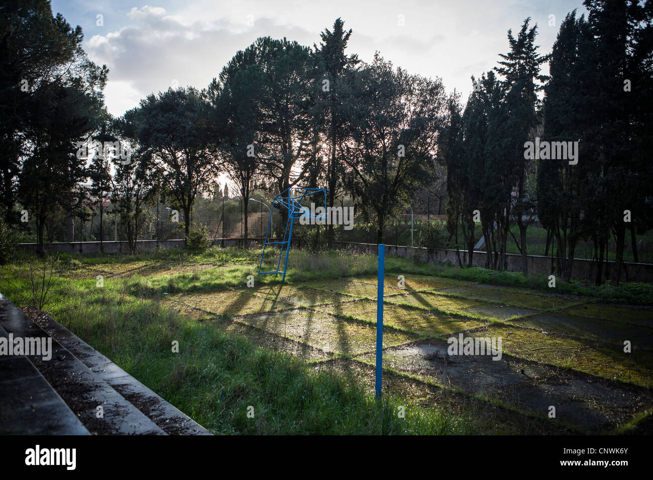 Overgrown basketball court in Garbatella, Rome, Italy, Europe Stock