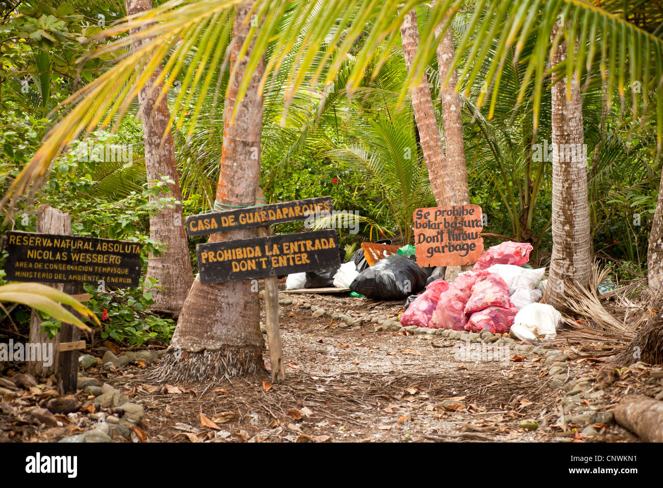 garbage at the entrance to Nicolas Wessberg Absolute Natural Reserve, Montezuma, Nicoya Peninsula, Costa Rica, Central America Stock Photo