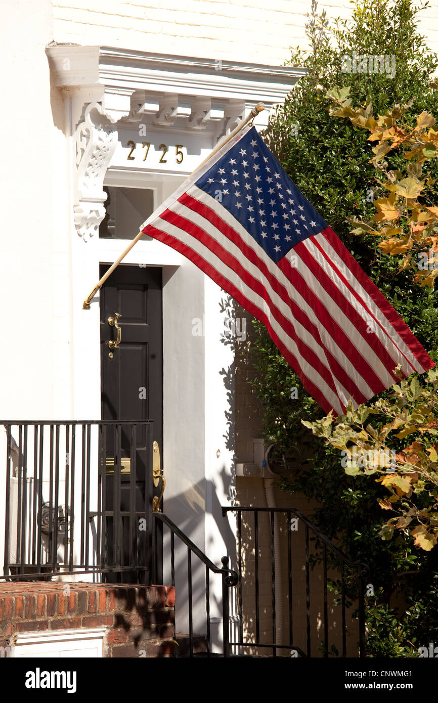 The stars and stripes flying outside a house in Georgetown Stock Photo