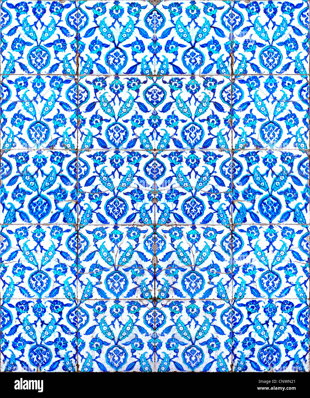 A seamless background image of ancient hand painted ceramic tiles from an islamic mosque. Stock Photo