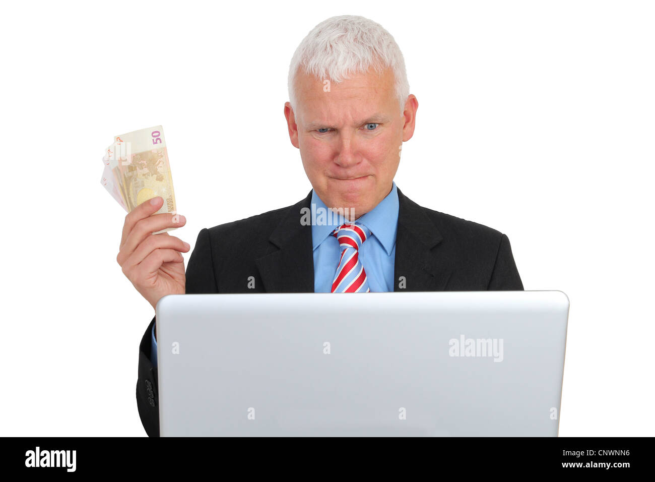 Businessman with Bills and Laptop on Sofa isolated Stock Photo