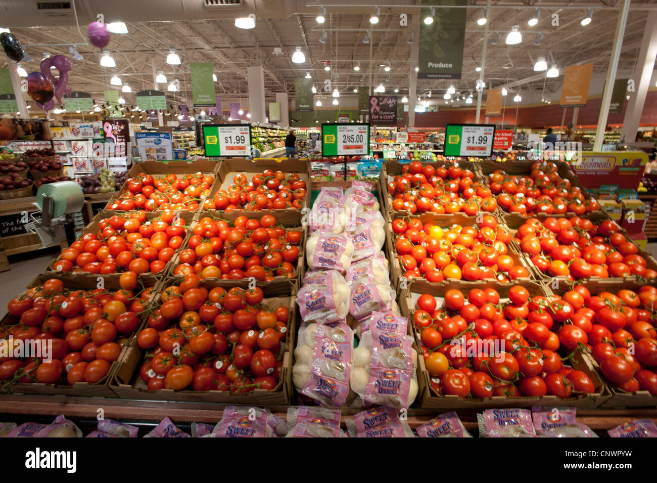 Produce section and tomatoes in grocery store Stock Photo Alamy