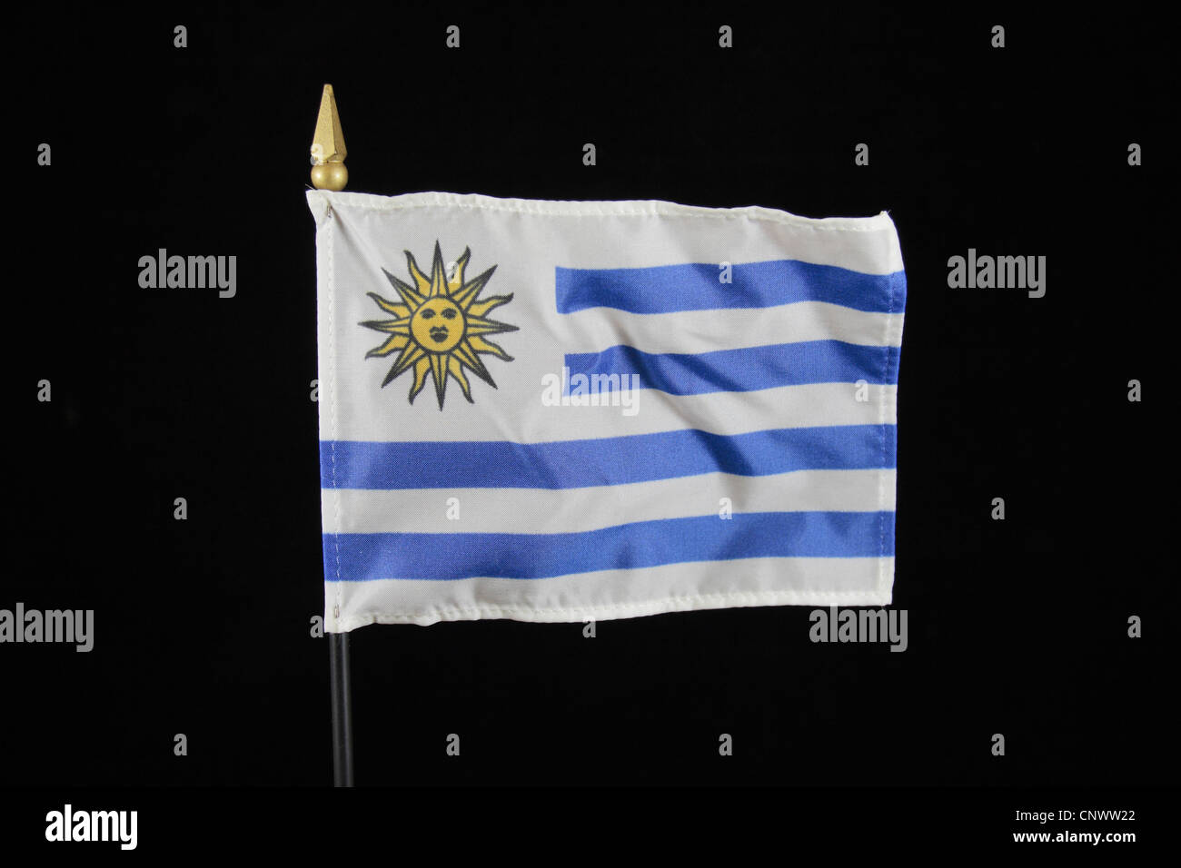 The national flag of Uruguay on a black background. Stock Photo