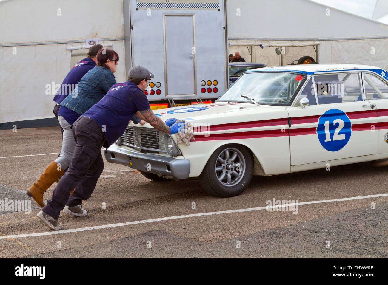 Gregory Thornton's 1964 Ford Falcon pushed through the paddock for the ...