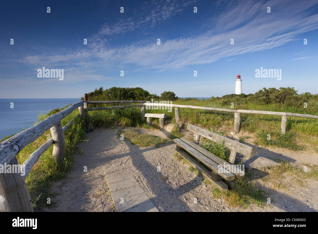 Sonnenuntergang am Strand, viewpoint at the sea with lighthouse in the background, Germany, Mecklenburg-Western Pomerania, Hiddensee, Hiddensee, Kloster Stock Photo