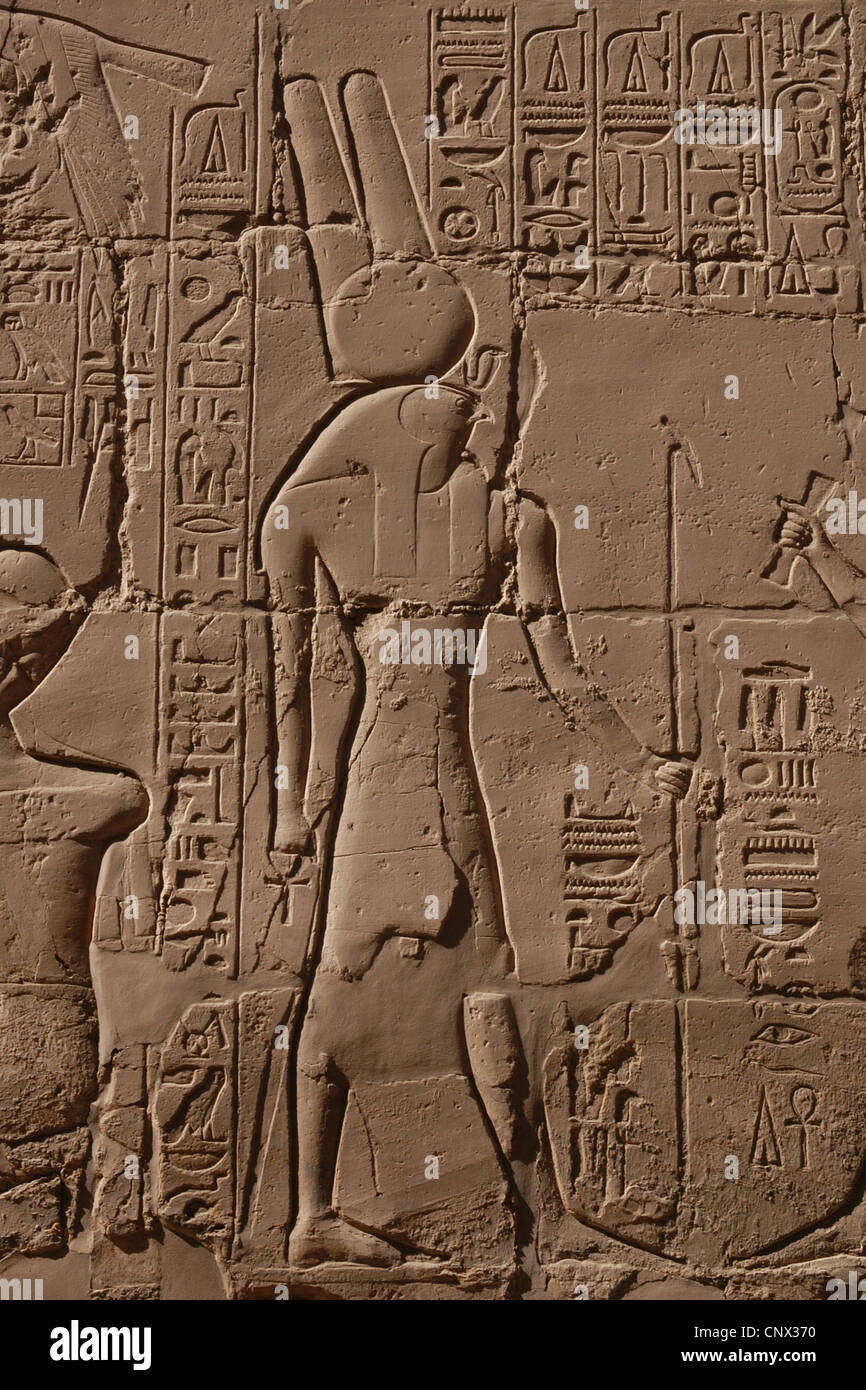 Ancient Egyptian god Horus. Relief in the Great hypostyle hall in the Karnak Temple Complex in Luxor, Egypt. Stock Photo