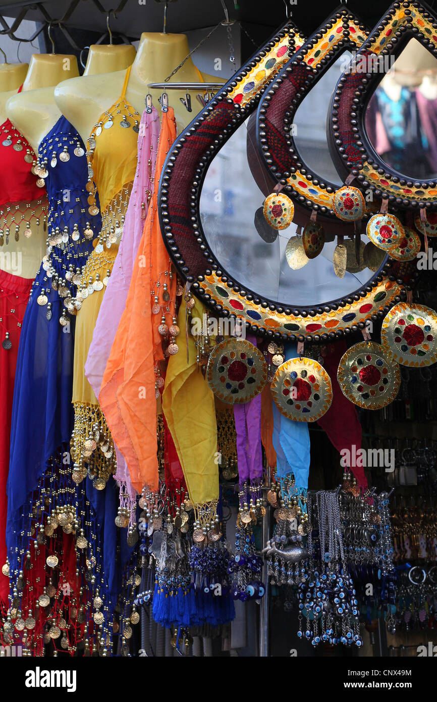 Shopping in the Middle East: A souvenir shop displaying jewelry, clothing and other decorative articles in Amman, Jordan. Stock Photo